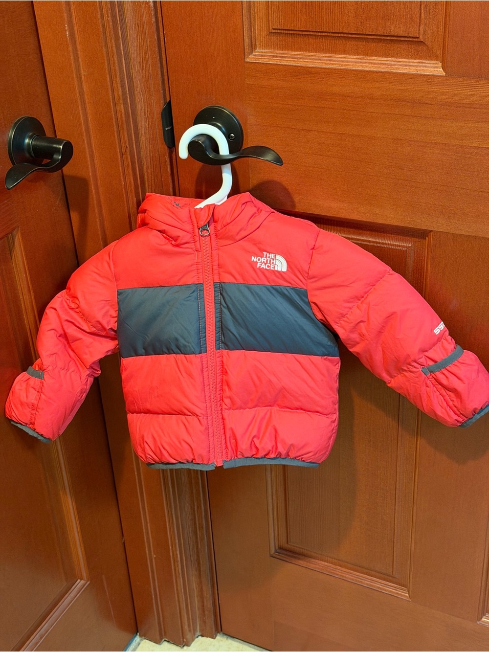 The North Face 6-12 month fleece lined red puffer coat.